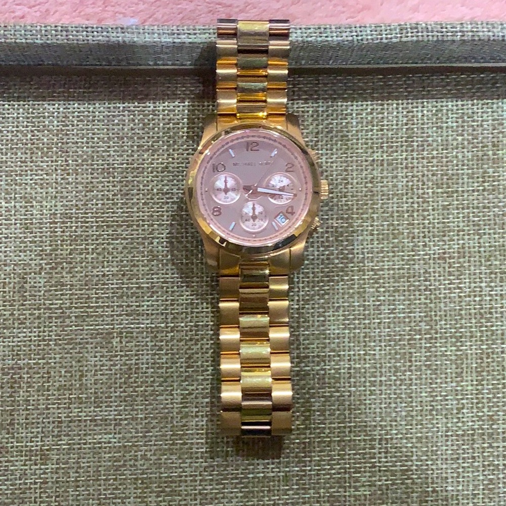 Pinkish face, rose gold Michael Kors watch